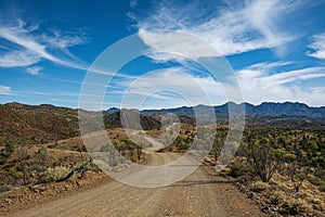 Outback Road with Mountainous Backdrop