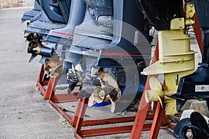 Outboard motors of the motor boats at marina