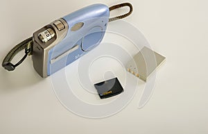 An outdated digital camera  white background