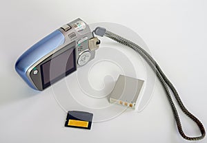 An outdated digital camera  white background