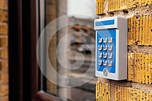 Outdated intercom device at apartment building entrance