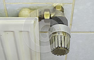 Outdated  old and dirty radiator valve, renewal of the heating  and co2 savings concept,copy space