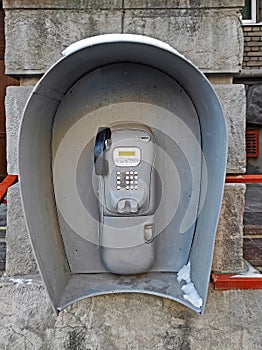 Outdated urban payphone