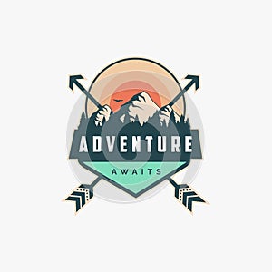 Outdoor adventure travel badge patch logo with mountain landscape