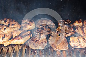 Outdoor barbecue -grilling chicken and beef meat