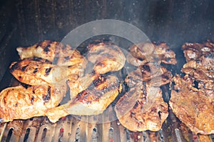 Outdoor barbecue -grilling chicken and beef meat