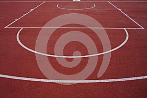 Outdoor basketball court with lines