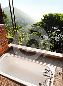 Outdoor bath room with view, tropical hill resort