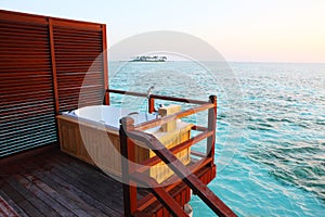 Outdoor Bathtub in sunset,Maldives