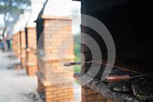 Outdoor BBQ made of bricks for cooking in public park