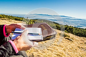 Outdoor Bible study during mountain hike in the fall