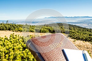 Outdoor Bible study during mountain hike in the fall