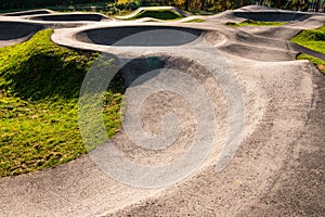 Outdoor bicycle asphalt pumptrack surrounded by nature in Polanka Wielka, Poland