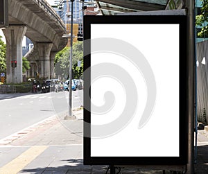 Outdoor billboard with mock up white screen on bus stop. clipping path for mockup