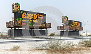 Outdoor billboards featuring restaurant menu