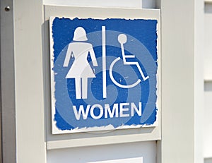 Outdoor blue women toilet sign