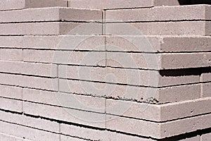 Outdoor building materials: stacked concrete masonry photo