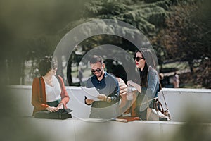 Outdoor business meeting with colleagues in casual attire