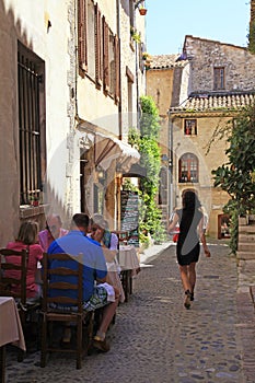 Outdoor cafe on beautiful narrow street, Provence