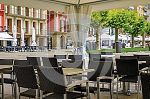 Outdoor cafe on historic Plaza del Castillo in Old Town Pamplona, Spain photo