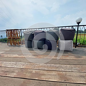 outdoor cafe table chairs in bogor with a view of geulis mountain