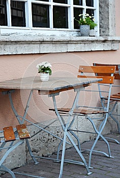 Outdoor cafe table in old European city