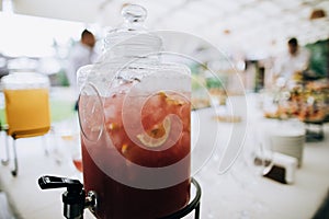 Outdoor catering servise - bottle with chilled refreshing cocktail drink