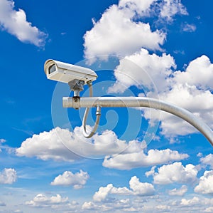 Outdoor cctv camera against blue sky