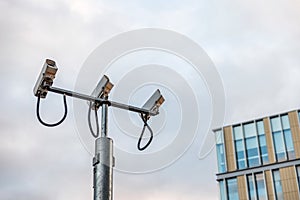 Outdoor CCTV Security camera facing up in British city