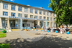 Outdoor celebration in honor of the presentation of graduation diplomas at the secondary technical faculty