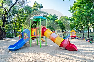 Outdoor children playground in green nature city park