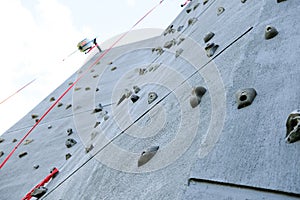 Outdoor climbing wall, an artificially constructed wall with grips for hands and feet