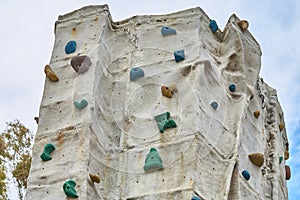 Outdoor climbing wall to practice the extreme sport of climbing photo