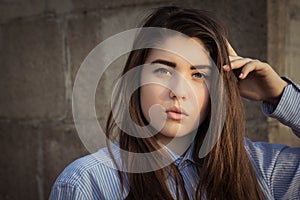 Outdoor close up portrait of a pretty teenage girl