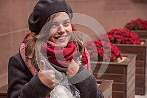 Outdoor close up portrait of young beautiful happy smiling girl