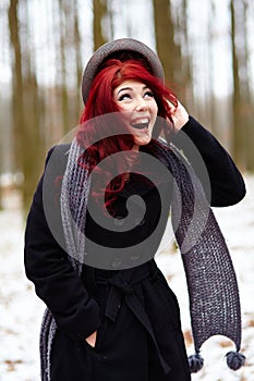 Outdoor closeup of happy young woman