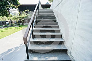 Outdoor concrete staircase connected to the hotel meeti
