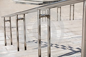 Outdoor Concrete Staircase With Stainless Steel Handrail, Front View, Close Up