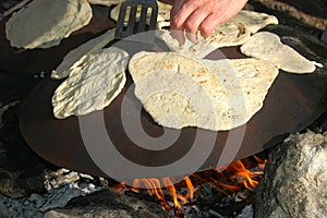 Outdoor Cooking Of Pita Bread