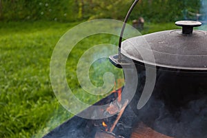 outdoor cooking in a pot