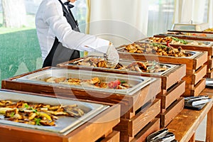 Outdoor Cuisine Culinary Buffet Dinner Catering. Group of people in all you can eat. Dining Food Celebration Party Concept. Servic