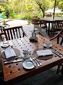 Outdoor dining restaurant, table cutlery settings