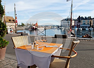 Outdoor dinner setting in Honfleur, France