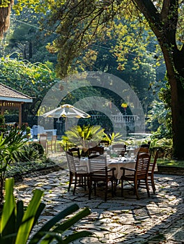 Outdoor diplomatic summit in a serene garden setting, round table discussions among international representatives photo