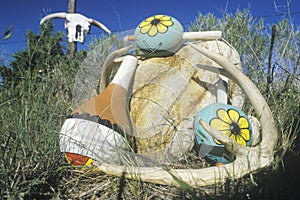 Outdoor display of colorful Hopi instruments in Taos, NM photo