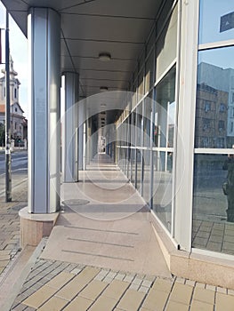 Outdoor empty corridor in the modern office building.