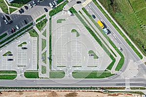 Outdoor empty parking lot in urban landscape. aerial top view from flying drone