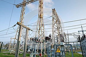 The outdoor extra high voltage power transformer. A high-voltage power electrical substation