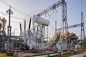 The outdoor extra high voltage power transformer. A high-voltage power electrical substation