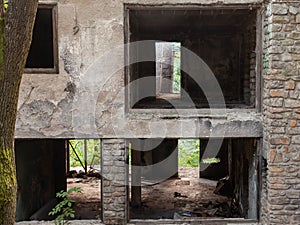Outdoor facade of the ruins of a demolished residential building decaying in an urban environment in Belgrade, Serbia